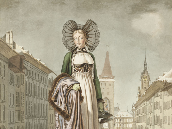 Femme en costume folklorique de Berne en hiver